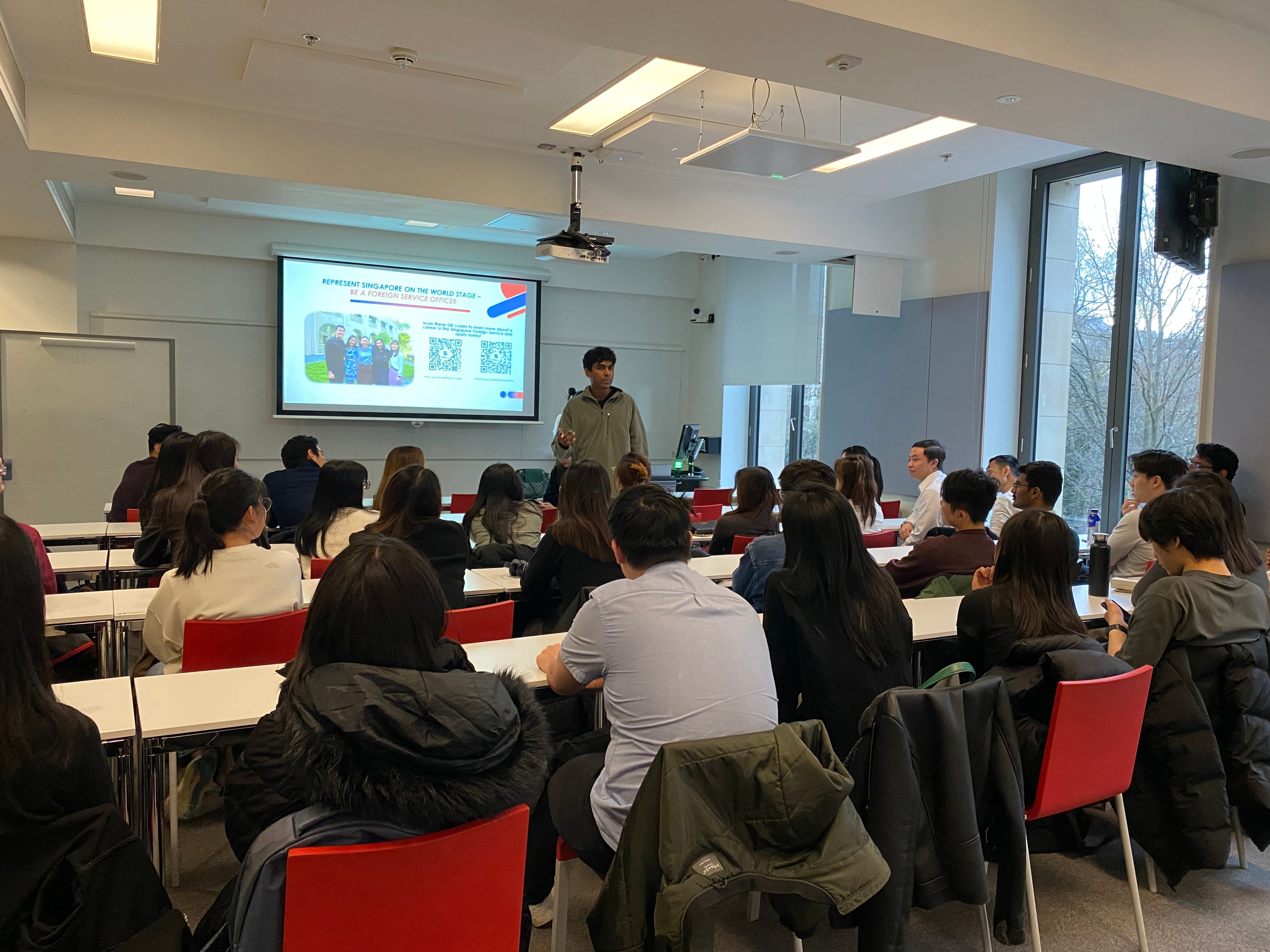 Speaker addressing students at an MFA career talk in a classroom